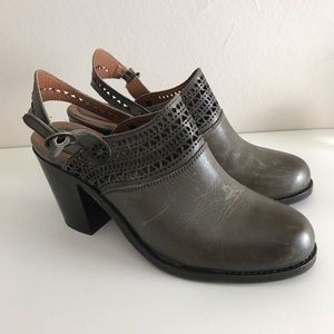 Ariat sling back mule.